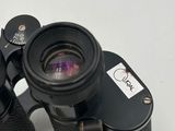 a pair of binoculars that are sitting on a table