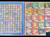 a box of pokemon trading cards with a lot of them