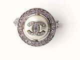 an image of a white pearl and diamond ring