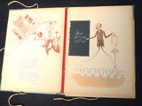 an open book with a drawing of a man in a suit and tie