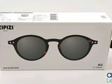 a close up of a box with a pair of sunglasses in it