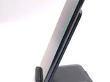 a cell phone that is sitting on a stand