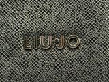 a close up of a black purse with the word ouul on it