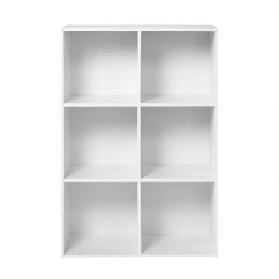 white bookshelf with six shelves on a white background