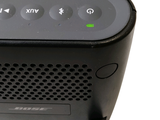 an image of a black speaker with buttons on it
