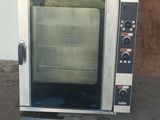 a small oven that is sitting in a room