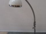 a lamp that is sitting on a table in a room