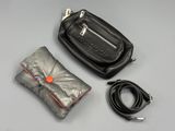 a black bag with a red button and a black bag with a red button and a black bag with a red button and a black bag with a red