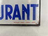 a blue and white plate with the word urant on it