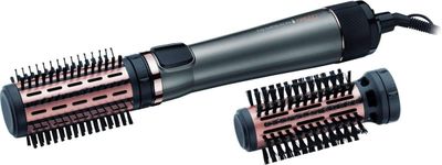 two different types of hair dryers and combs on a white background