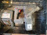 a drill and a drillet sitting in a box