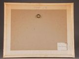 an old picture frame with a ring on the bottom of it