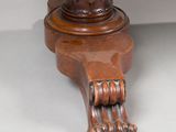 a wooden table with a glass top on it