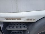 a close up of a vehicle ' s emblem on the side of the vehicle