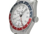 rolex watch with red, white, and blue bezeled bezel