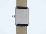 an image of a close up of a wrist watch on a white surface