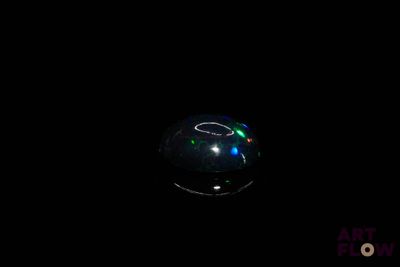 the bubbles are glowing in the dark with a black background