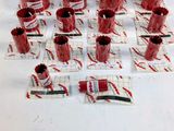 many red cups and a knife on a white table
