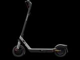 an image of a scooter is shown against a black background