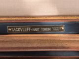 a close up of a plaque on a piano