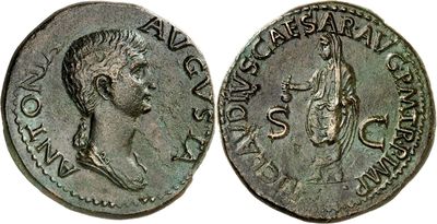 a silver coin with an image of a man and a woman on it