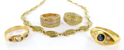 several different types of gold jewelry including rings, rings, and bracelets