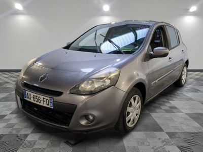 a picture of a silver car parked in a garage