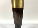 pair of brass and wood vases on pedestals