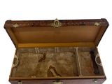 an old wooden box with two compartments inside of it