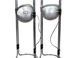 pair of chromed metal table lamps on stands with cord