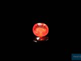 a red diamond on a black background