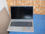 a laptop that is sitting on a blue table