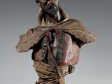 buste d'un homme coiffé d'un turban et portant une écharpe autour du cou