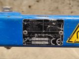 a close up of a sign on a blue bike