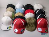a lot of hats that are sitting on a table