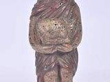 statue of a woman holding a baby in her arms