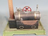 a small model of a steam engine on a table