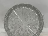 a clear glass plate with a circular design on it