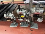 two machines that are sitting on the floor