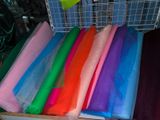 a lot of different colored tulle on a table