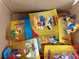 a cardboard box with a bunch of toys inside of it