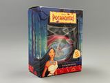 disney pocahonita doll in a box on a grey background