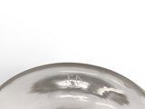 a glass bowl that is sitting on a table