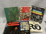 a lot of books that are sitting on a table