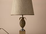 an image of a lamp on a table with a lamp shade on top of it