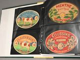 four different types of coasters in a binder