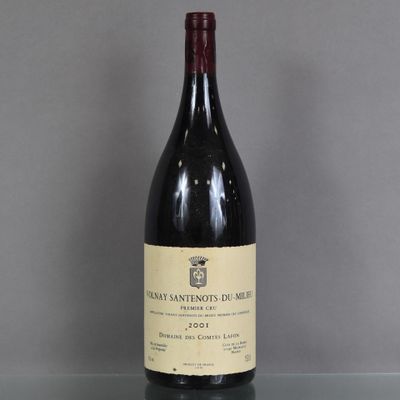 a bottle of wine that is sitting on a table