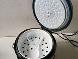 a black and white bucket with a white lid and a black and white bucket with a white lid