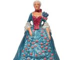 an image of a figurine of a woman in a blue dress