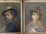 two framed portraits of children wearing hats and scarves, one of which is wearing a shawl